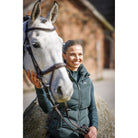 Schockemöhle Marleen Style Women's Padded Vest in Bottle worn at the barn