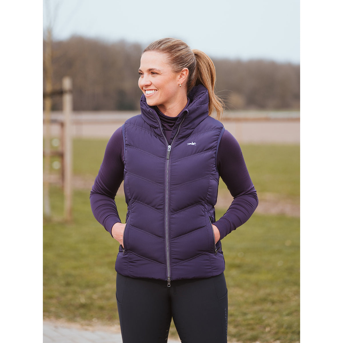 Schockemöhle Marleen Style Women's Padded Vest in Dark Purple worn outdoors