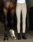 Schockemöhle Darleen Classic Knee Grip Breech - on rider, shown from waist down, standing next to horse | Malvern Saddlery