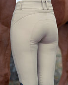 Schockemöhle Darleen Classic Knee Grip Breech - back view on rider with horse in background, shown from waist to knee | Malvern Saddlery