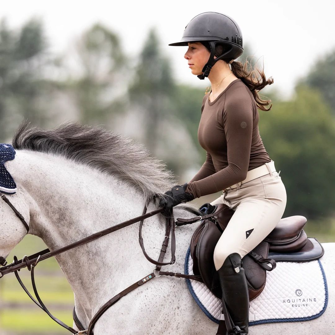 TKEQ Kennedy Seamless 2.0 Long Sleeve Performance Shirt - Espresso, shown on rider on white horse | Malvern Saddlery