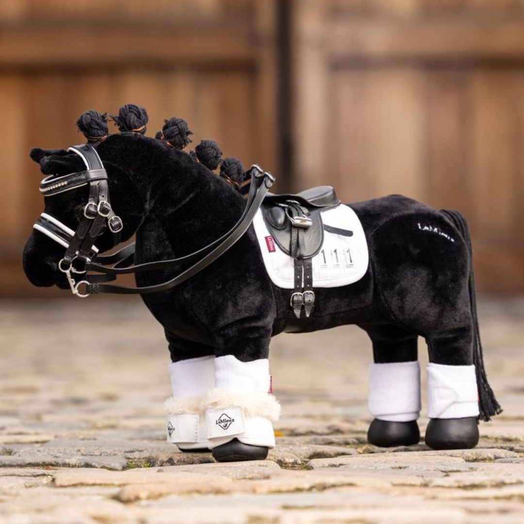 LeMieux Toy Pony Dressage Over Reach Boots - White - shown on Valegro with other toy dressage tack accessories | Malvern Saddlery