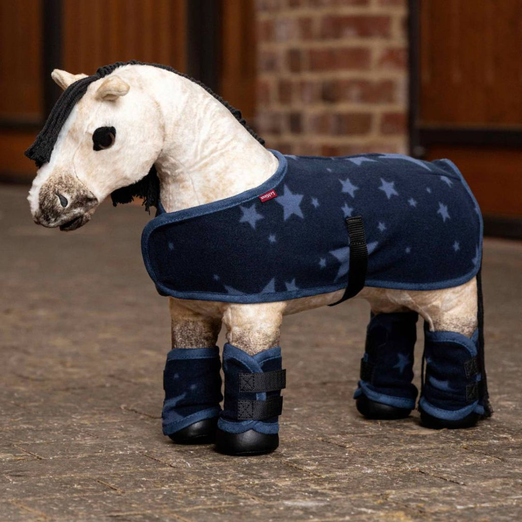 LeMieux Toy Pony Fleece Travel Boots & Tail Guard - Atlantic Blue with stars, shown with Fleece travel blanket on Dream | Malvern Saddlery