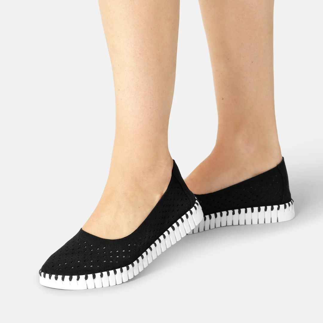 Ilse Jacobsen Tulip Ballet Flat - Black; on woman's feet, gray background | Women's Shoes | Malvern Saddlery