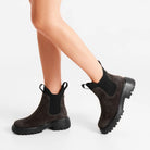 Woden Isabella Suede Boot - Chocolate brown on woman's feet white background | Ladies Short Boots | Malvern Saddlery