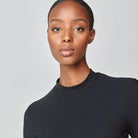 Yagya Women's Lightweight Long Sleeve Riding Top - Black, mock neck close-up | Malvern Saddlery