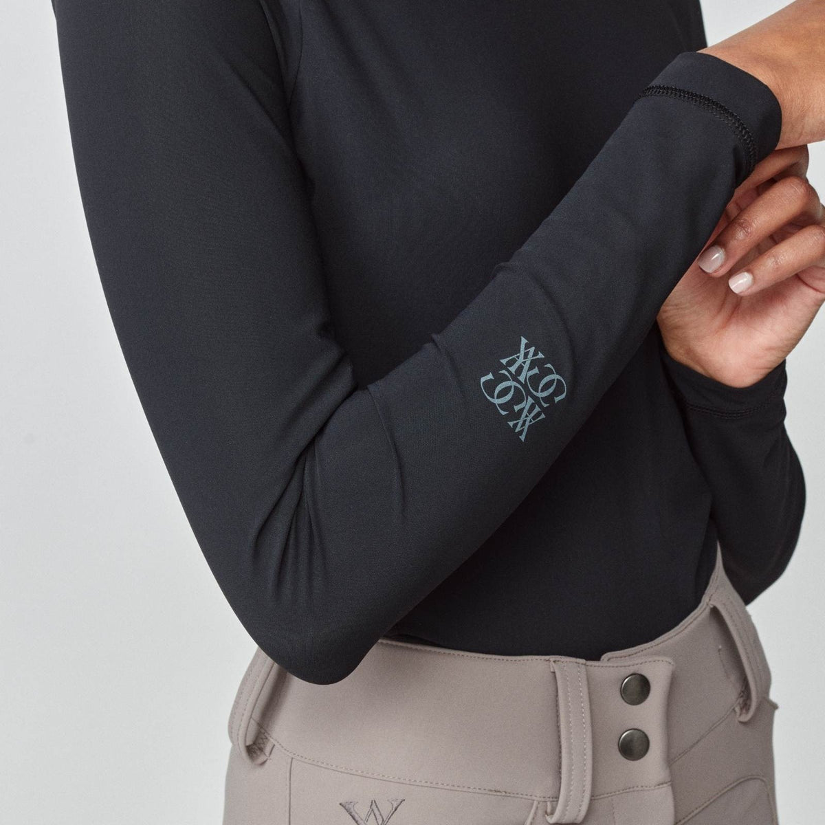 Yagya Women's Lightweight Long Sleeve Riding Top - Black, sleeve logo | Malvern Saddlery