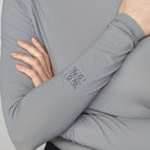 Yagya Women's Lightweight Long Sleeve Riding Top - Stone, sleeve logo | Malvern Saddlery